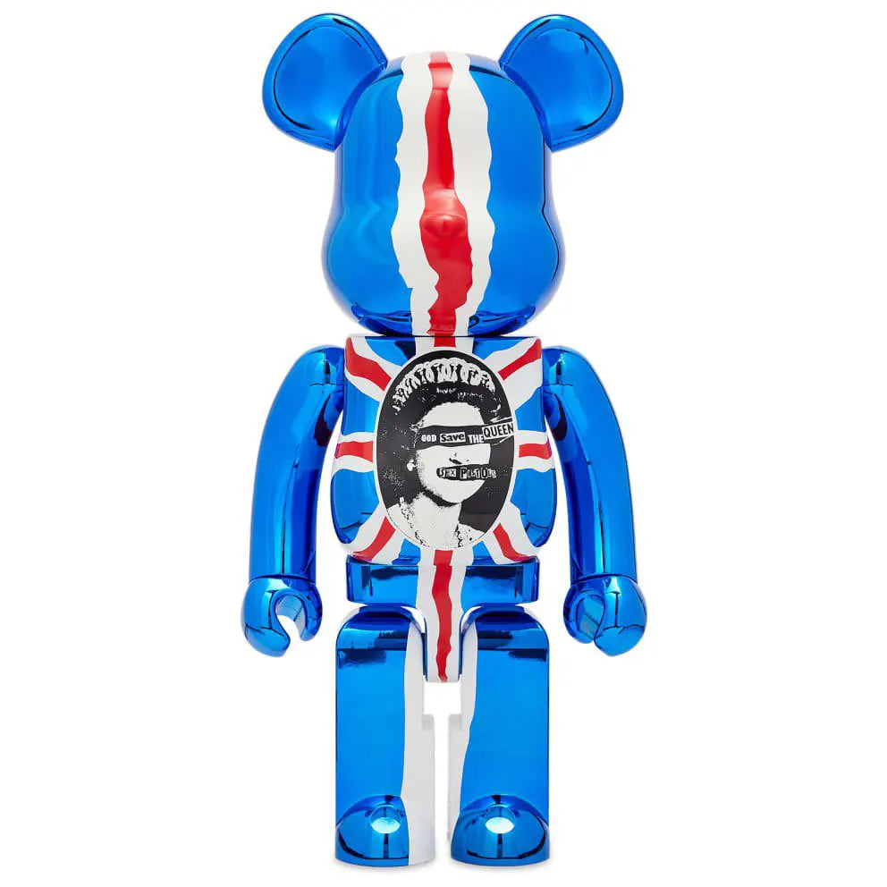 Chrome Bearbrick featuring Union Jack and vintage Sex Pistols cover design with “God Save the Queen” type layered over a stylized portrait.