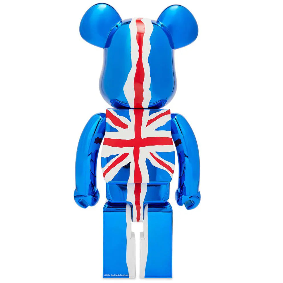 Rear design of 1000% Bearbrick Sex Pistols figure showing hand-painted British flag details on a mirrored chrome body.