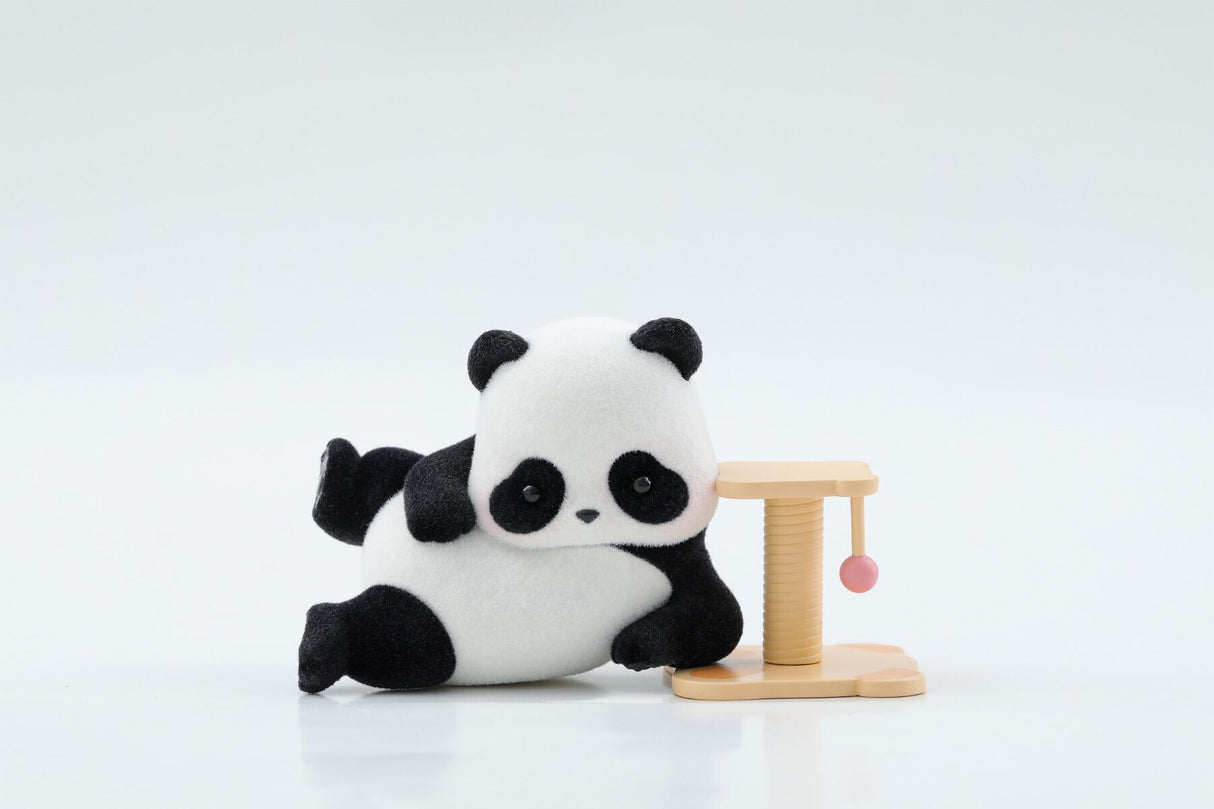 Panda Roll Panda As A Cat blind box figure lounging beside scratching post toy