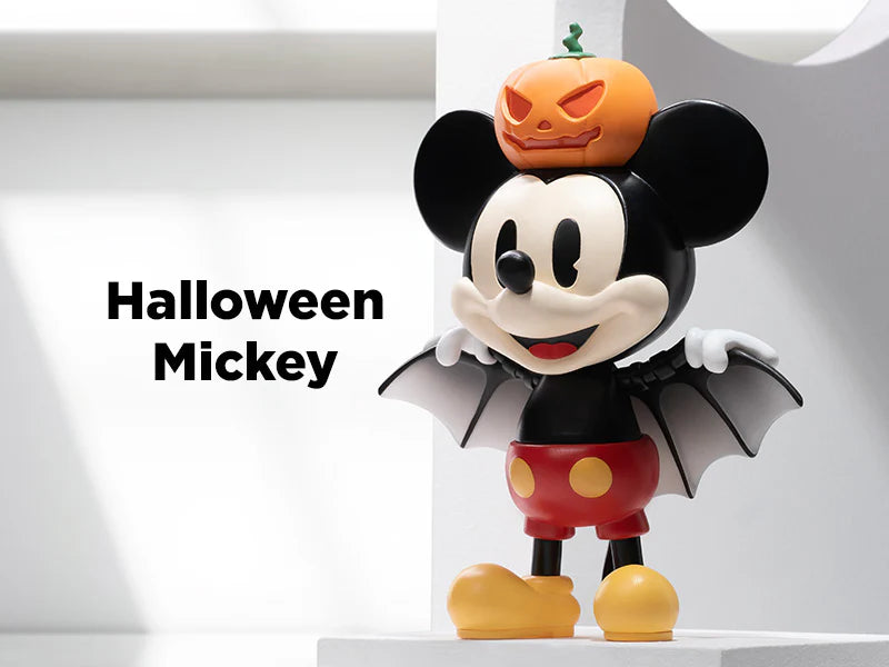 Halloween Mickey figure dressed with bat wings and a pumpkin hat from Disney 100th Anniversary Ever Curious Series.
