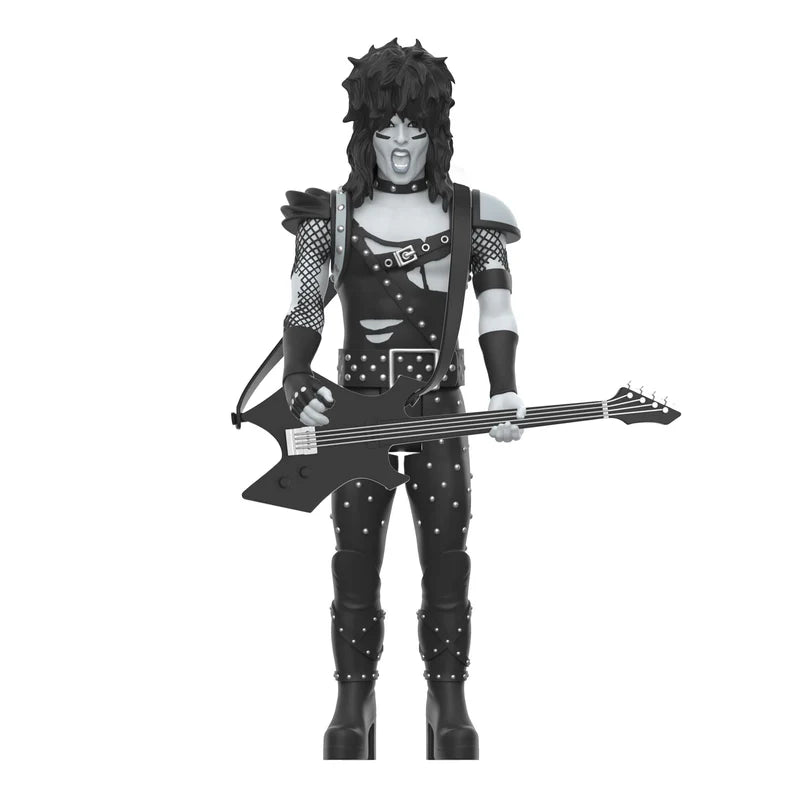 Close-up of Nikki Sixx ReAction figure in black-and-white outfit with bass guitar accessory