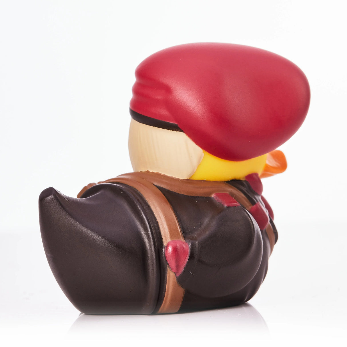 Rear view of Revolver Ocelot Mini TUBBZ showing beret and backpack