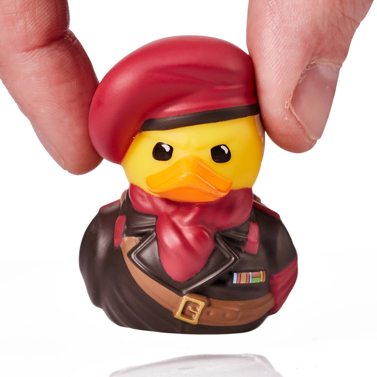 Hand holding Revolver Ocelot Mini TUBBZ duck figure