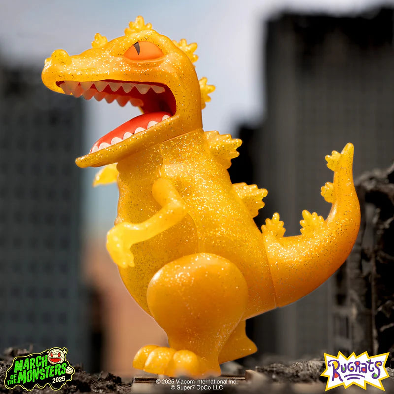 Close-up of Sunrise Reptar in an urban diorama with sparkle effect.