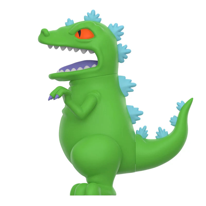 Side profile of green Reptar figure showing sculpted tail and blue spikes.