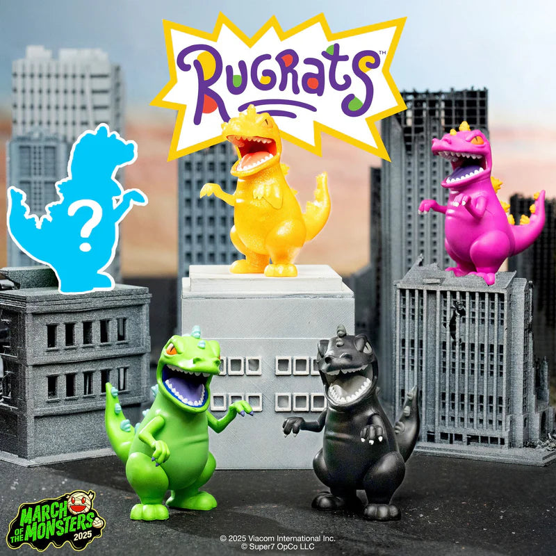 Group shot of all Reptar figures posed in a city scene with Rugrats logo above.