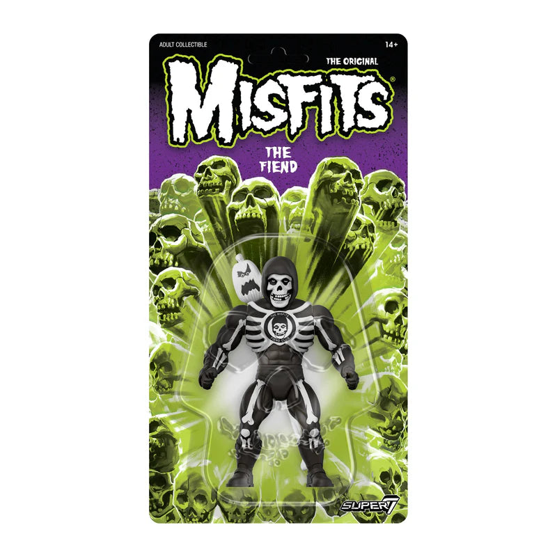 The Fiend Misfits figure in full retail blister packaging with neon skull background.