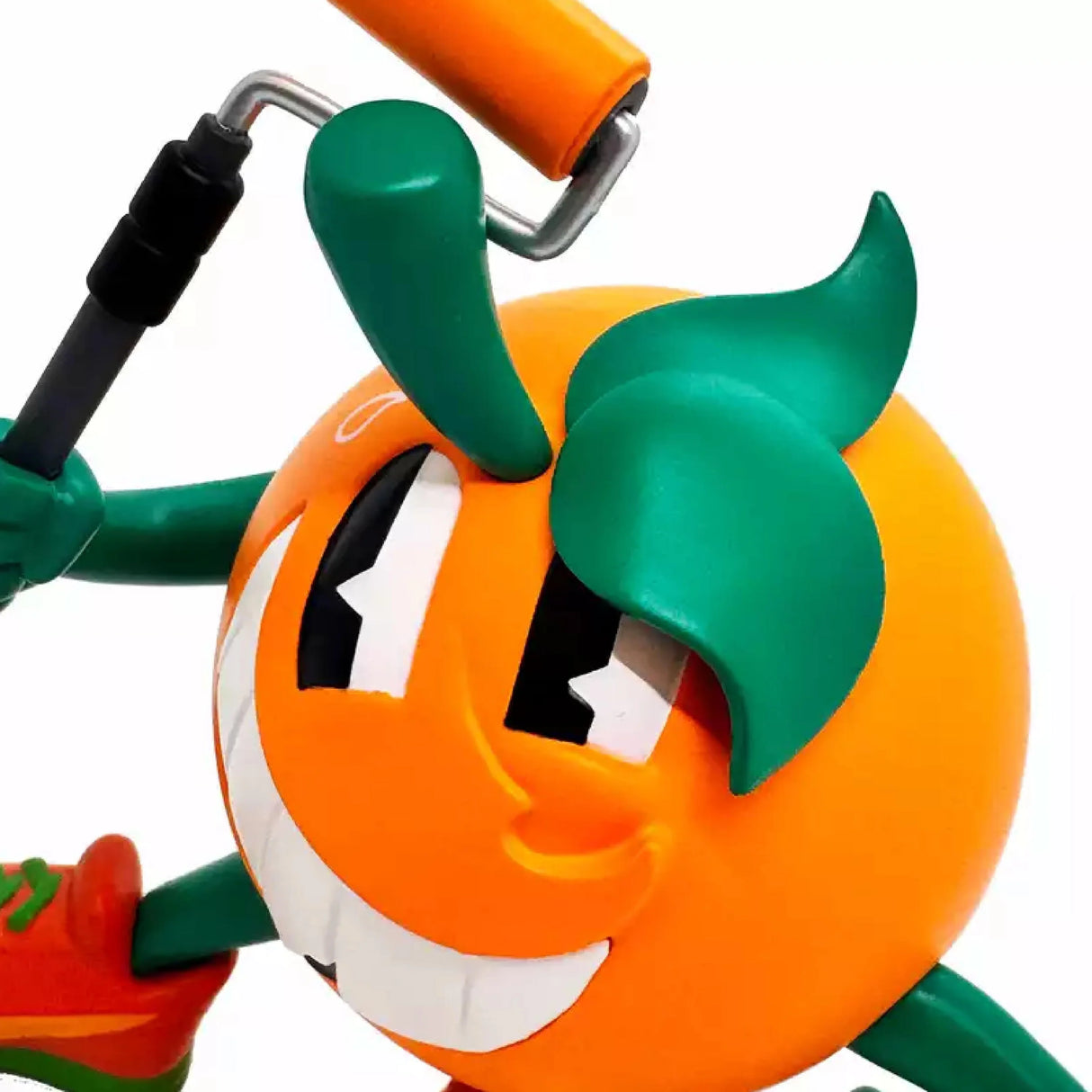 Atomik Orange OG Roller vinyl figure posed in front of matching box artwork