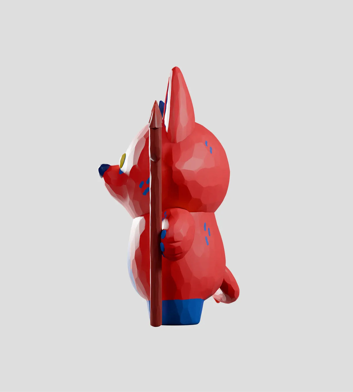 Side profile of Bubba Bad art toy showing sculpted shape and pitchfork