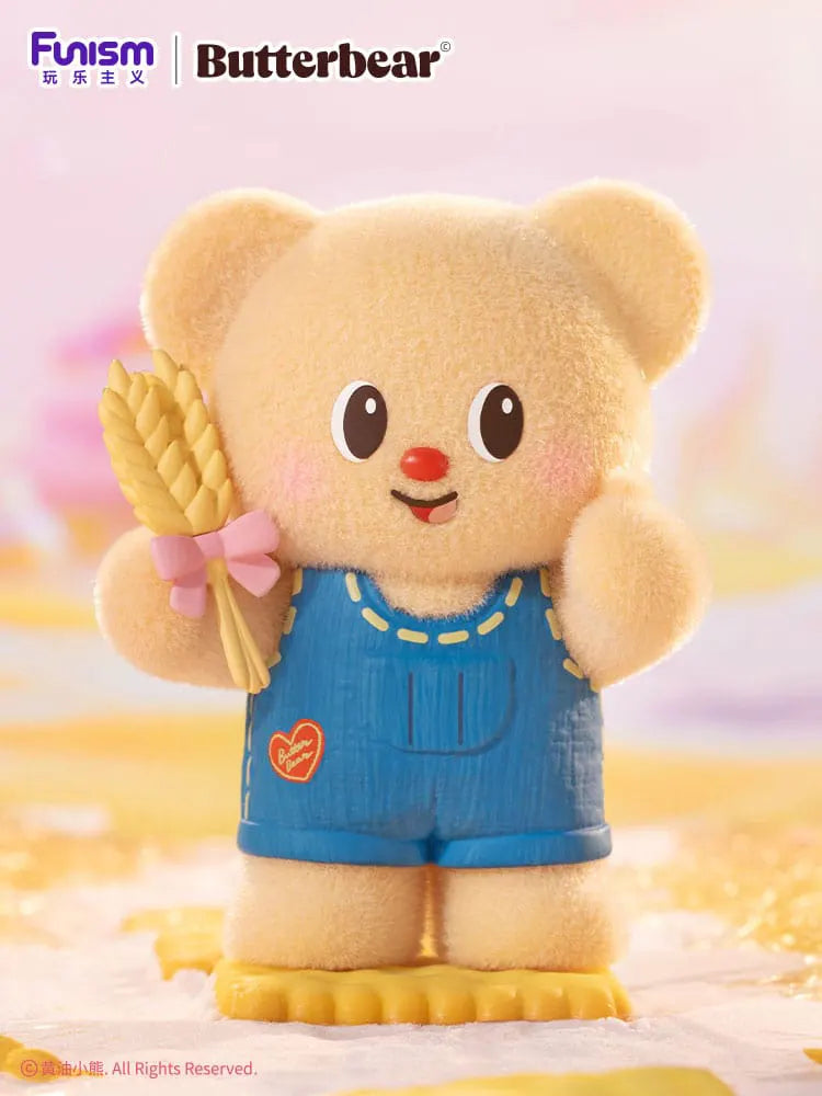 Butterbear wearing blue overalls holding wheat – My Buttery Bakery Blindbox Series