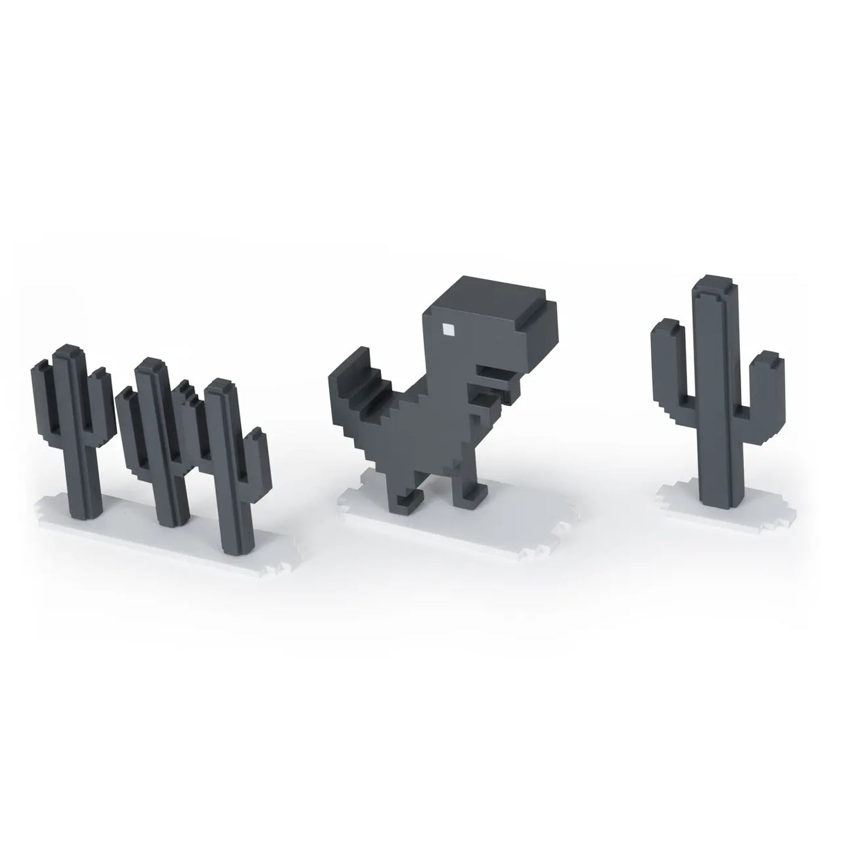 Angled view of the Chrome Dino toy and cacti layout on white background.