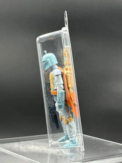 Side view of action figure displayed inside clear EVORETRO clamshell protector