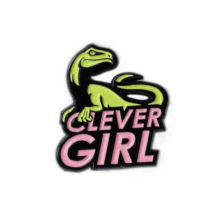 Clever Girl enamel pin on shirt, neon dinosaur with pink text by Yesterdays