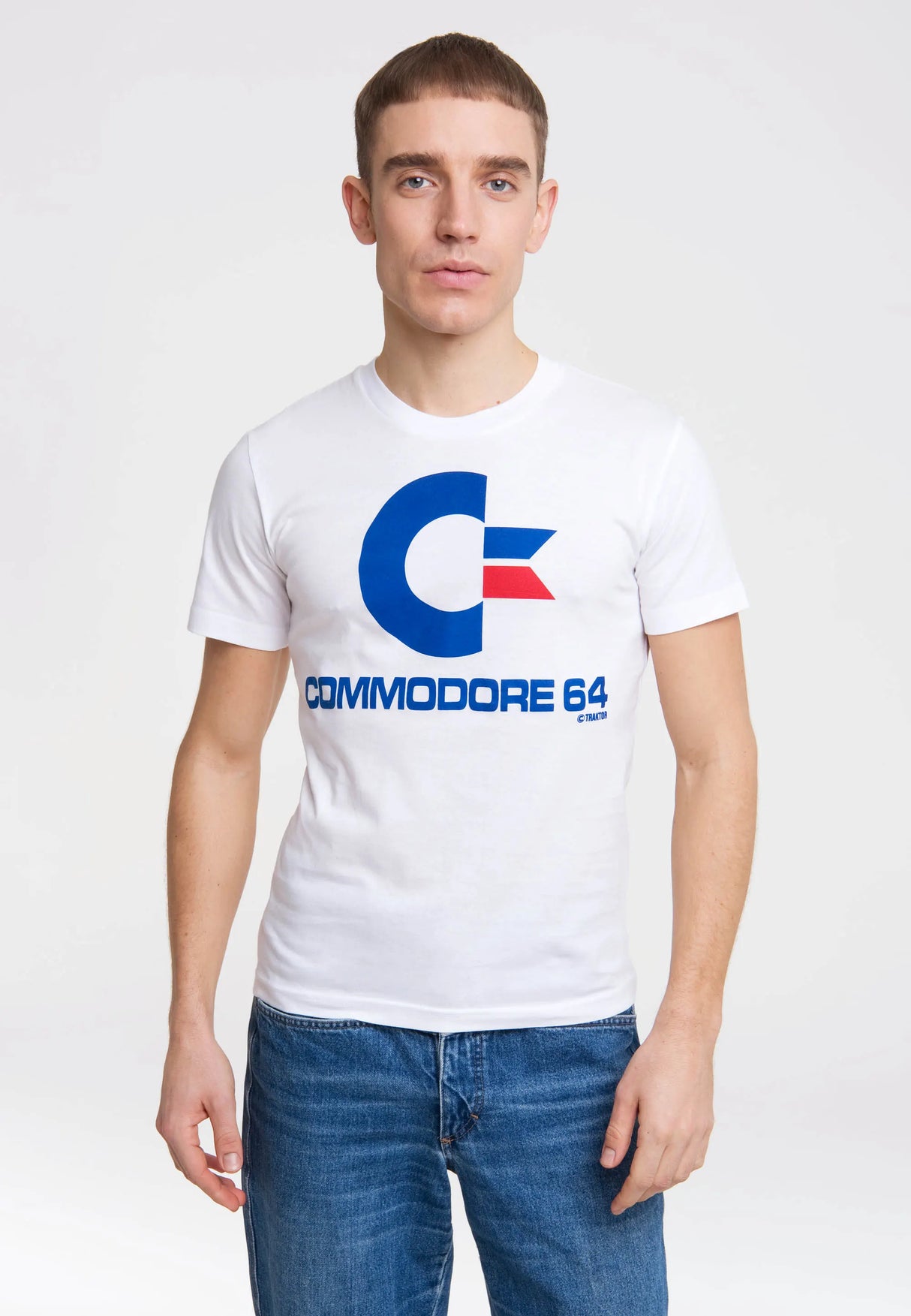 Model wearing the white Commodore 64 T-Shirt with retro C64 logo design.