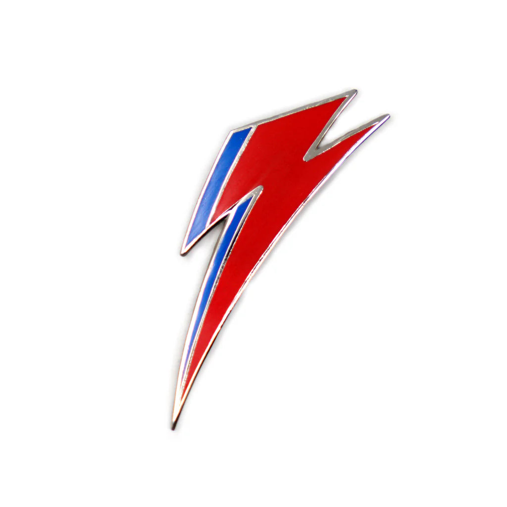 Red and blue lightning bolt enamel lapel pin close-up
