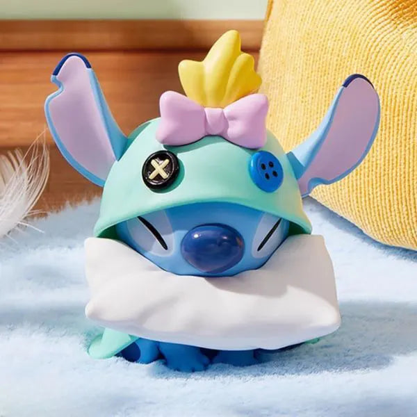 Sleeping Stitch vinyl figure with hat and button details from Pillow Fight Series