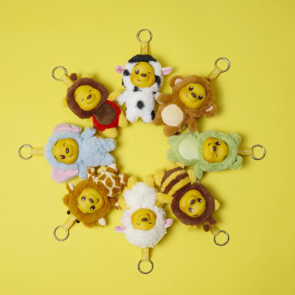 Winnie the Pooh plush keychain animal costume blind box collection displayed on yellow background