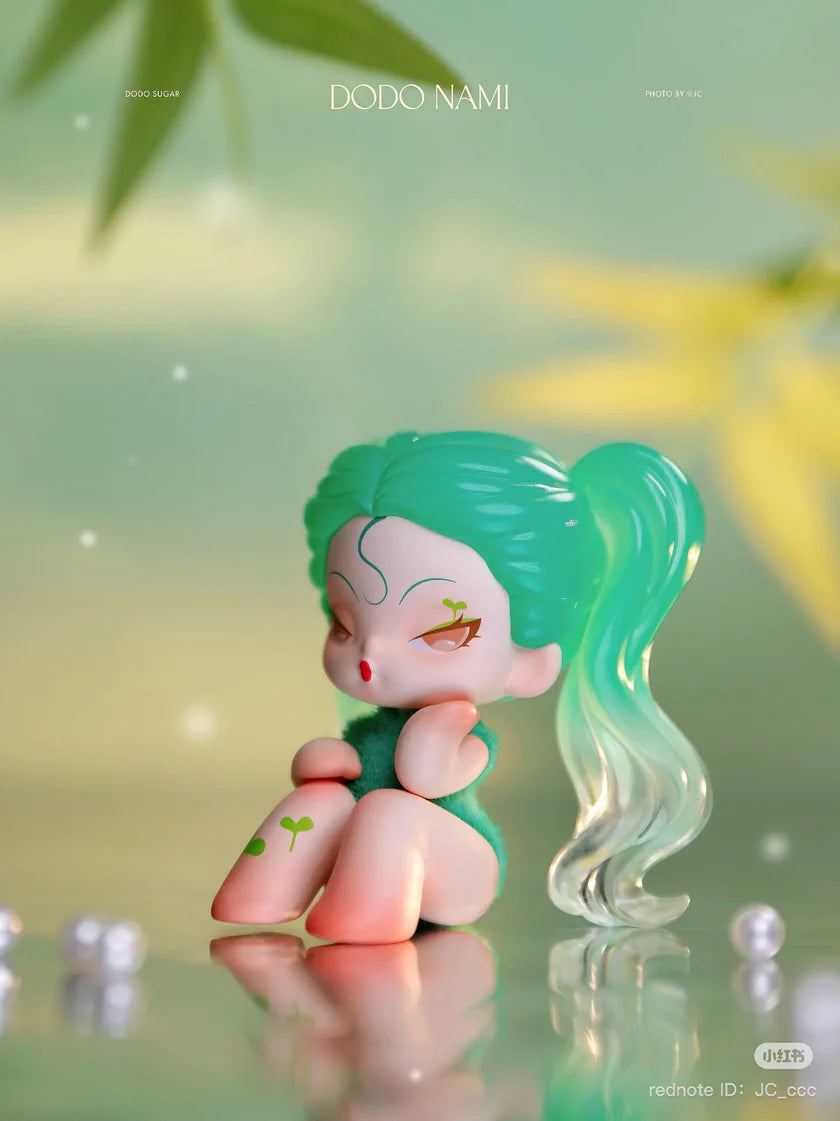 DODO Nami Garden Of Eden blindbox figure with green hair and leaf sprout tattoo design.