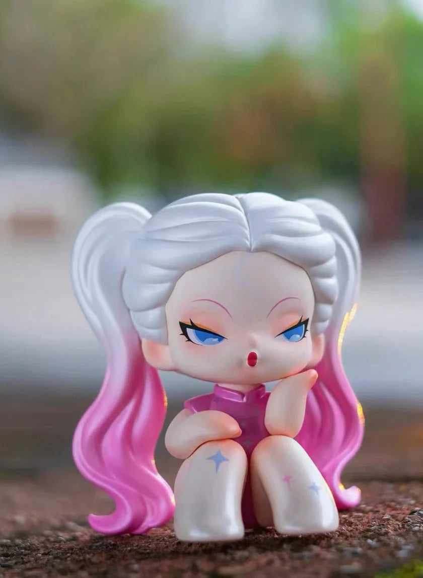 DODO Nami collectible figure with white and pink gradient twin tails and star tattoos.