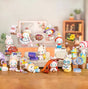 Full set of EMMA Fairy Babe Academy blind box figures displayed in a cozy living room scene.