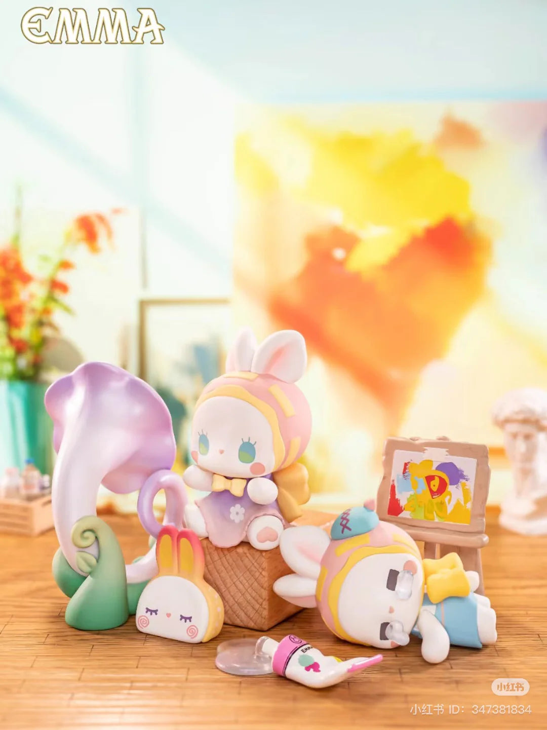 EMMA Fairy Babe Academy figures Jammin’ BooParoo and Wacky Doodle Boop in an art studio with paint and canvas.