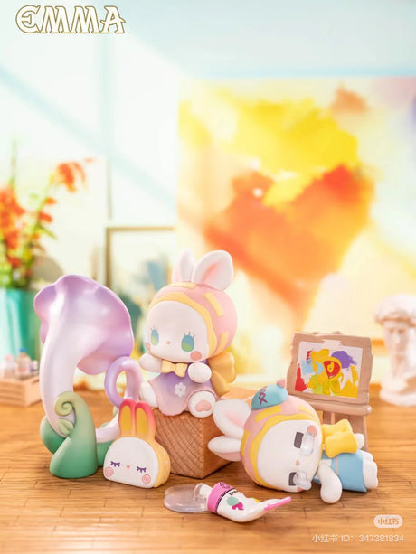 EMMA Fairy Babe Academy figures Jammin’ BooParoo and Wacky Doodle Boop in an art studio with paint and canvas.