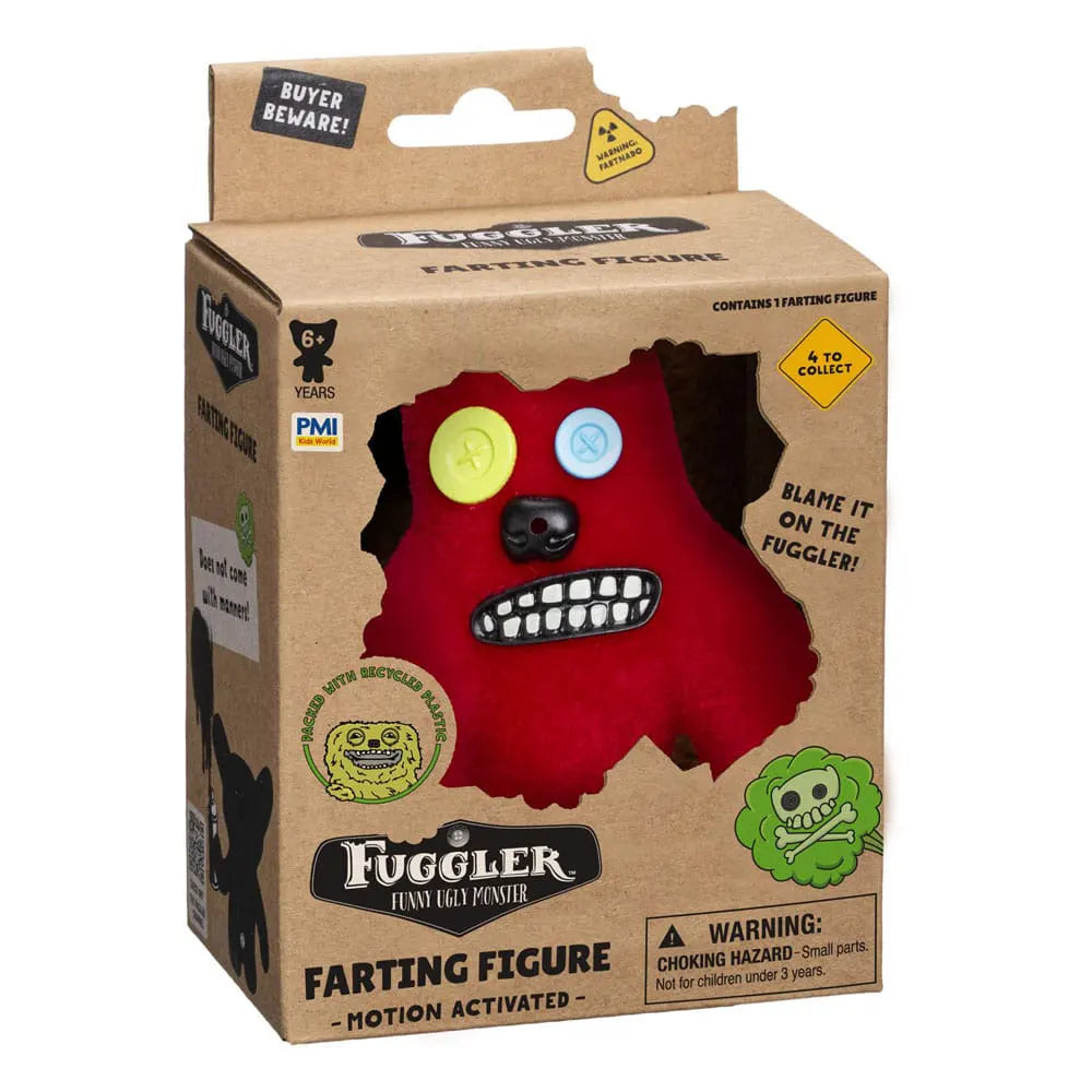Red Fuggler motion-activated vinyl figure with button eyes and toothy grin.
