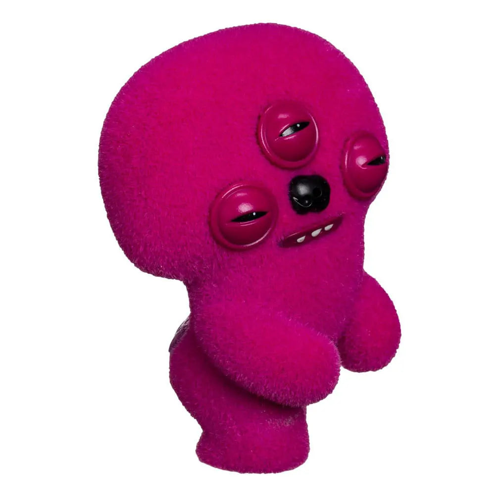 Purple three-eyed Fuggler motion-activated vinyl figure with sound effect.