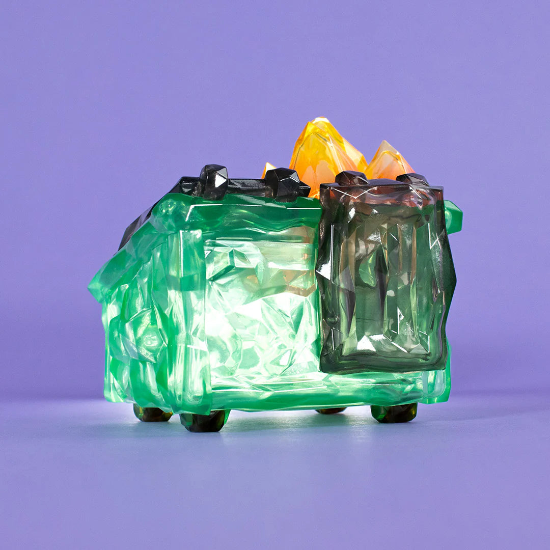 Side view of Gem Dumpster Fire vinyl figure highlighting crystal flame sculpt