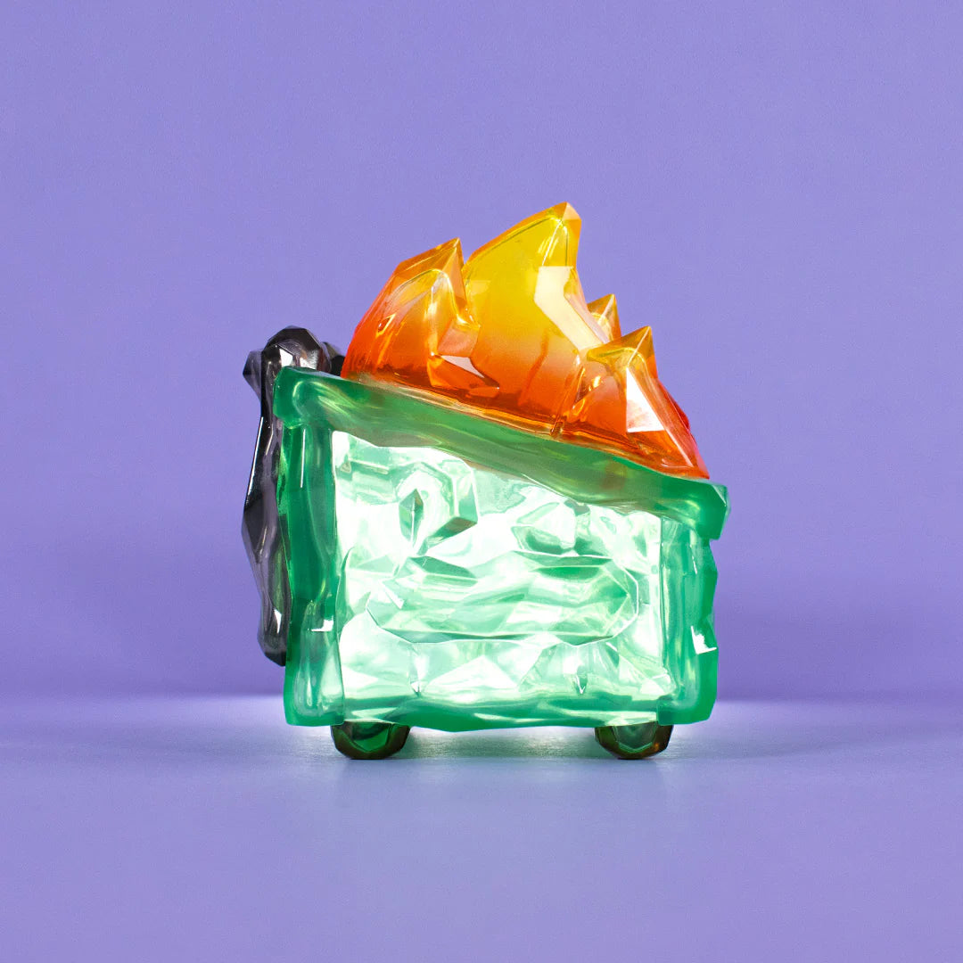Gem Dumpster Fire vinyl figure showcasing glowing gemstone-style finish