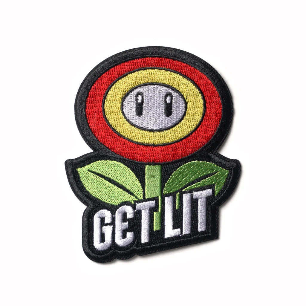 Nostalgic iron-on patch featuring embroidered fire flower with green leaves and bold lettering