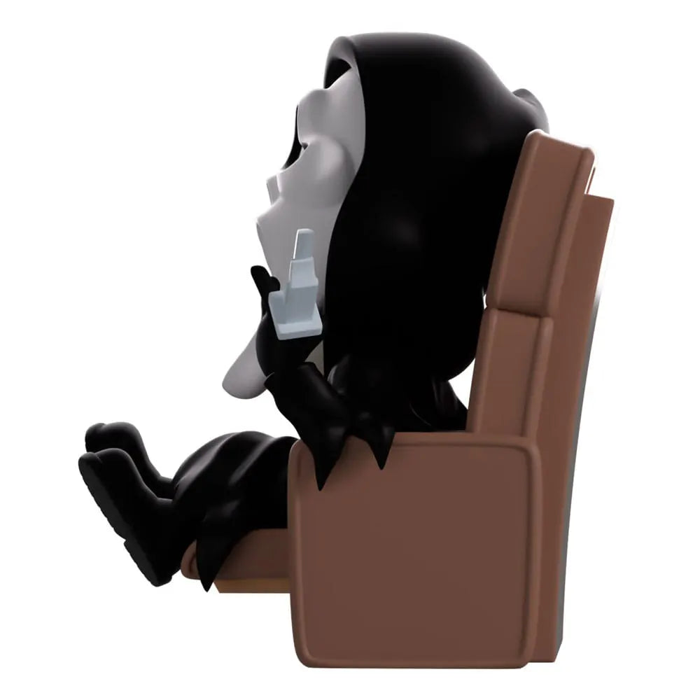 Ghostface lounging figure side profile holding knife and phone