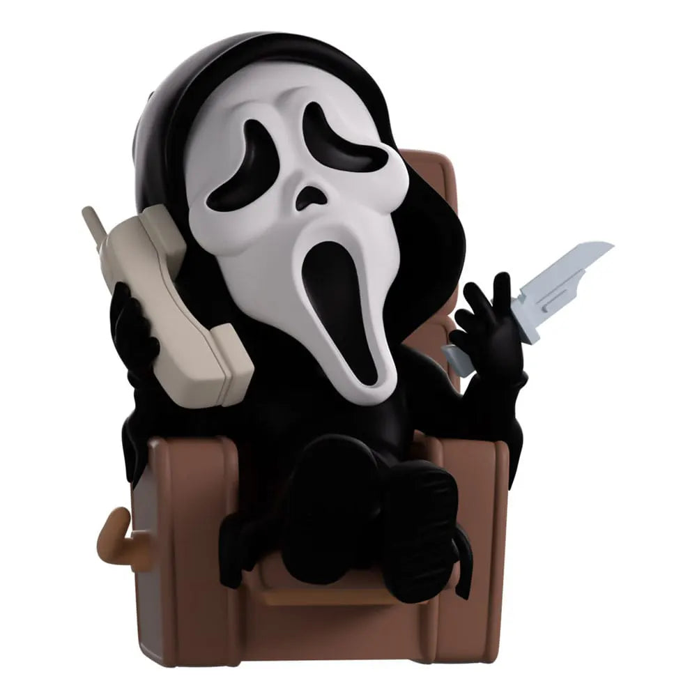 Front view of Ghostface Youtooz figure in chilling pose with accessories
