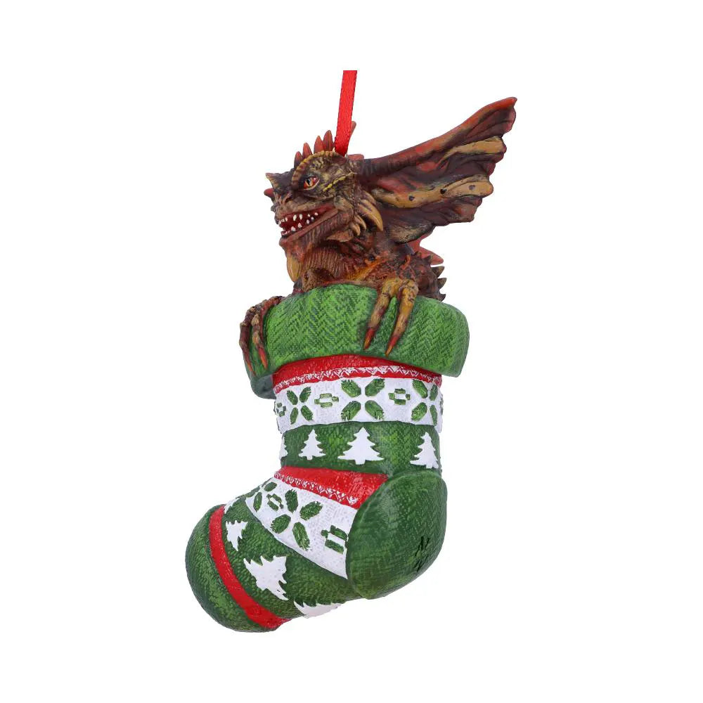 Side view of Mohawk sitting in a festive Christmas stocking