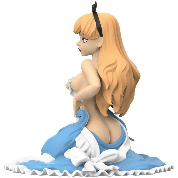 Rear view of The Wanderer art figure showing flowing hair, exposed back, and elegantly sculpted fabric details on a ruffled base.