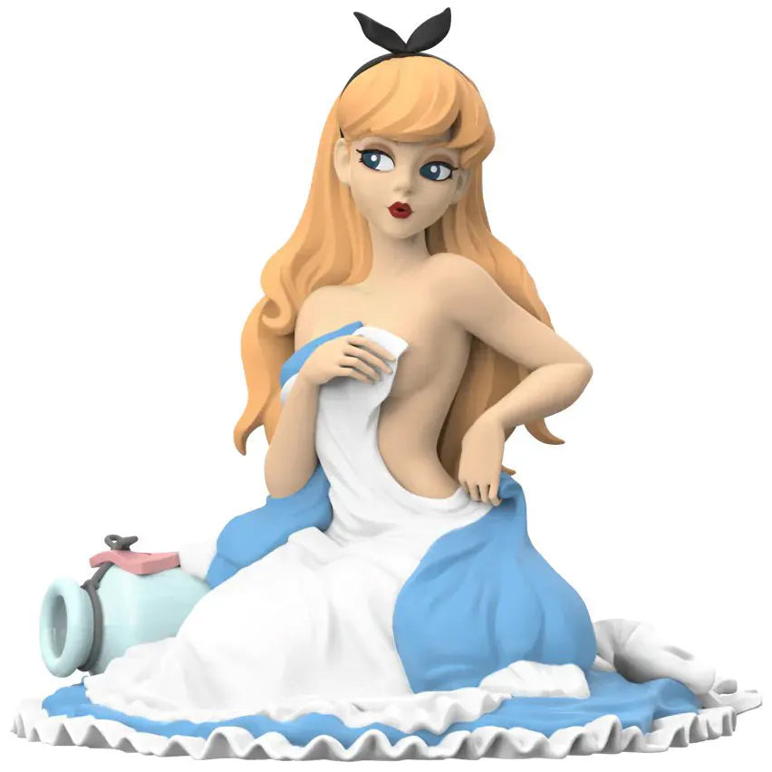 Front view of The Wanderer vinyl figure by Mighty Jaxx, posed on a ruffled blanket, holding fabric to cover her chest, with a potion bottle nearby.