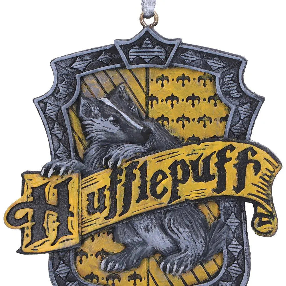 Close-up of Hufflepuff badger and ornate crest details