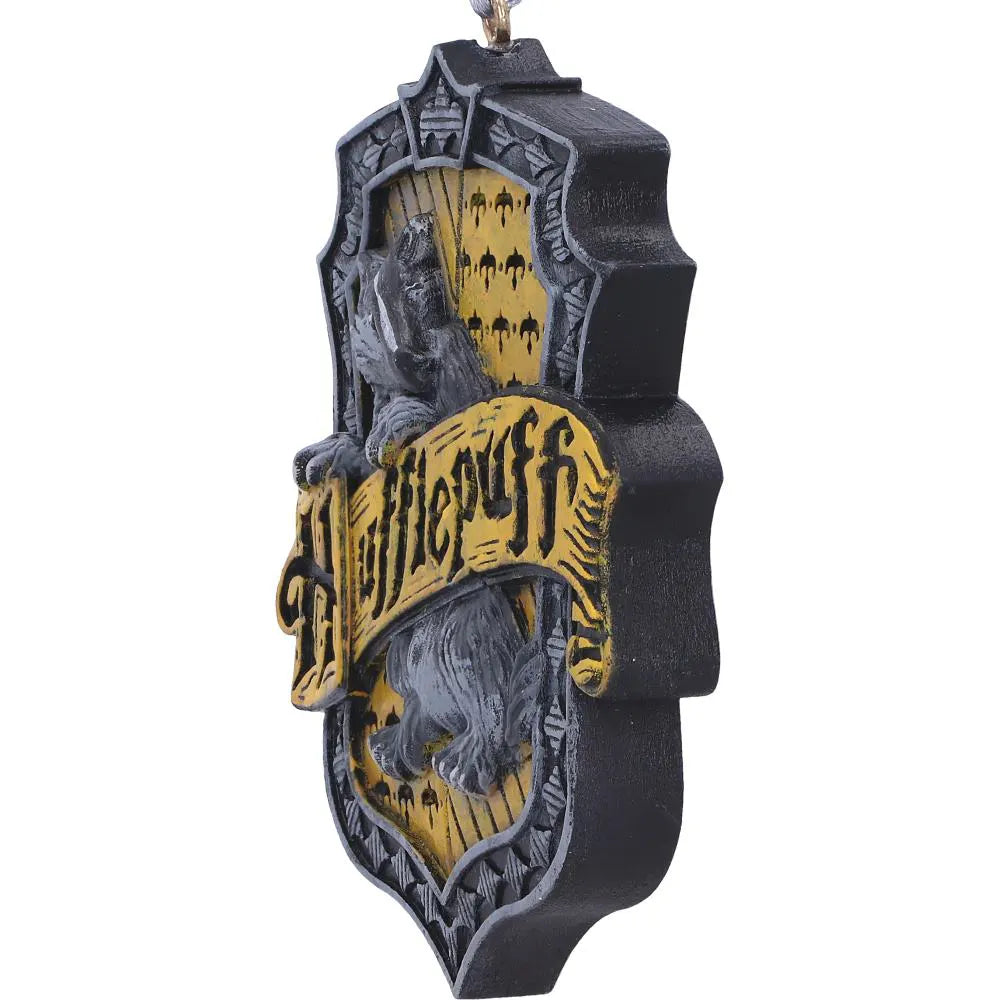 Side view of Hufflepuff badger and ornate crest details