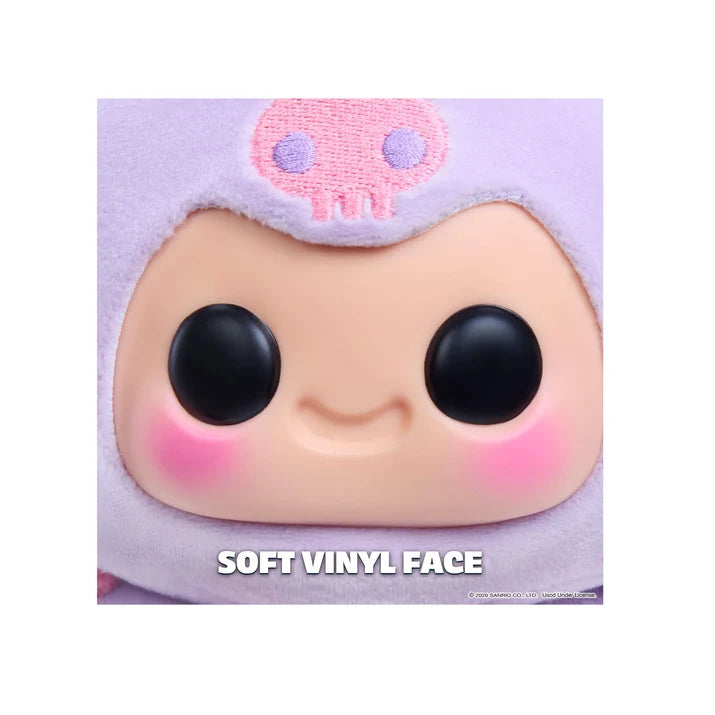 Close-up of Hyojo Kuromi collectible's soft vinyl face featuring large black eyes, rosy pink cheeks, and embroidered pink skull.