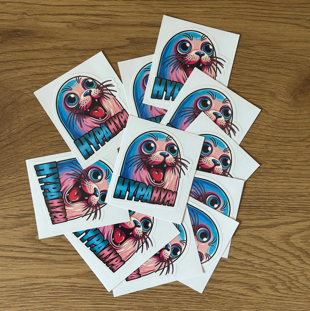 Pile of HypaHypa Seal Stickers 10-Pack with colorful seal mascot design and HypaHypa logo.