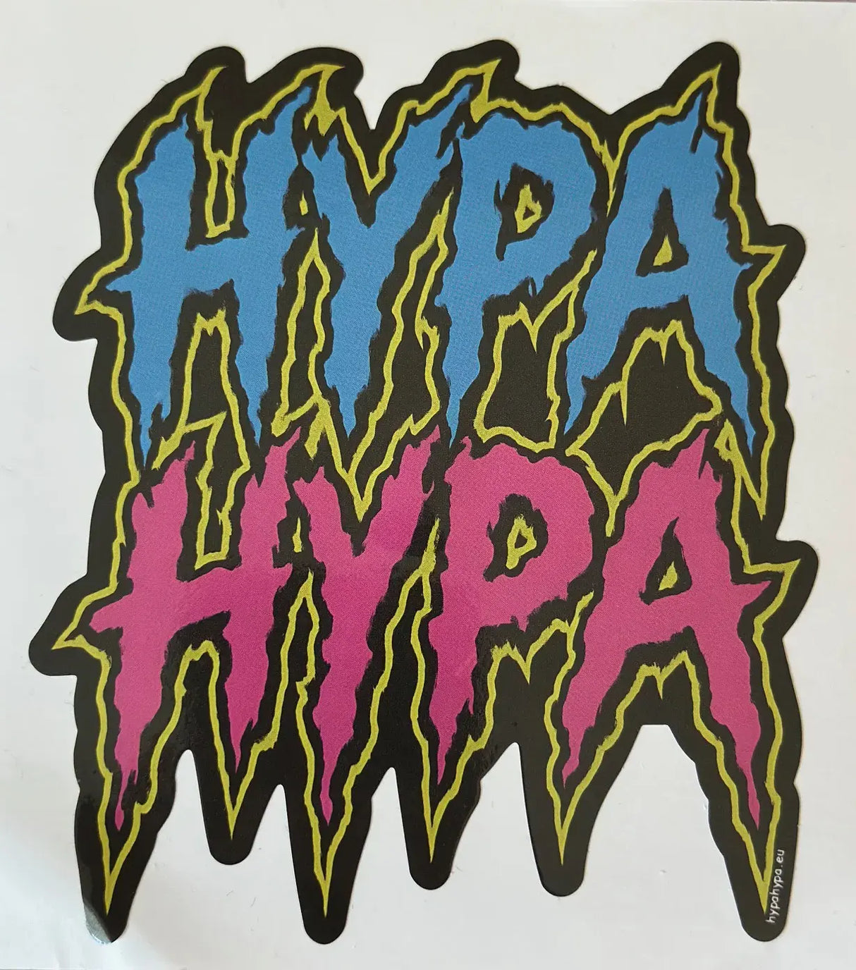 Close-up of a single HypaHypa splat logo sticker with blue and pink lettering and yellow outline.