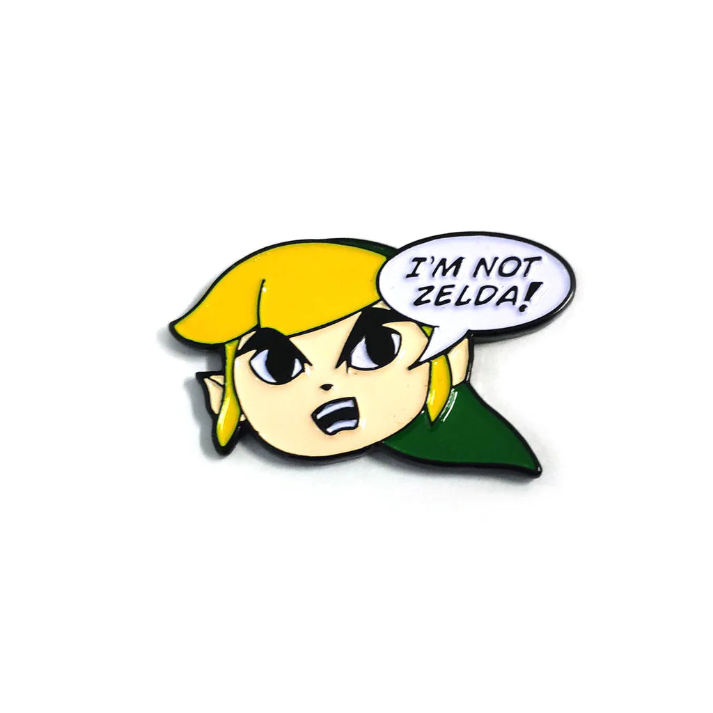 I'm Not Zelda enamel pin featuring Link’s face and comic speech bubble