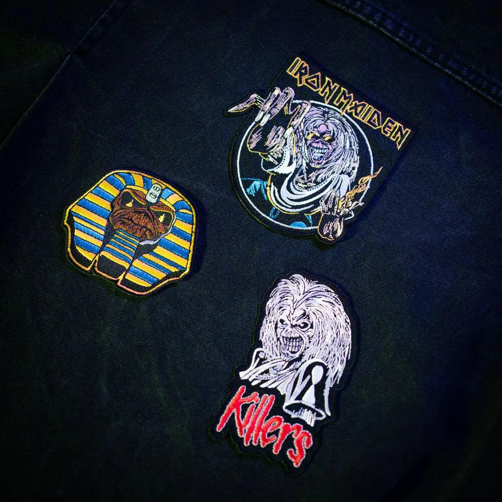 Iron Maiden patches displayed on denim jacket with Eddie artwork