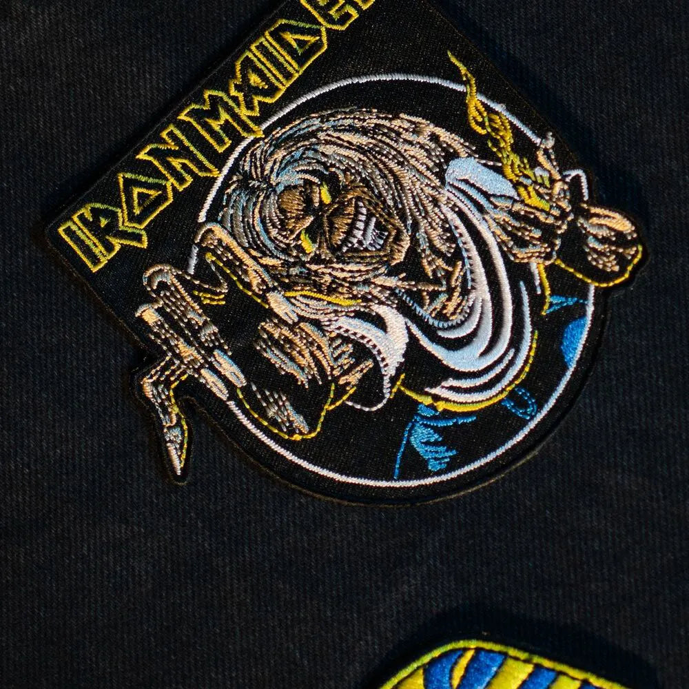 Close-up of Iron Maiden embroidered Eddie patch attached to fabric