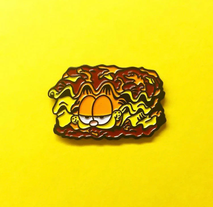 Soft enamel Garfield lasagna pin – SDCC 2024 collectible by Yesterdays