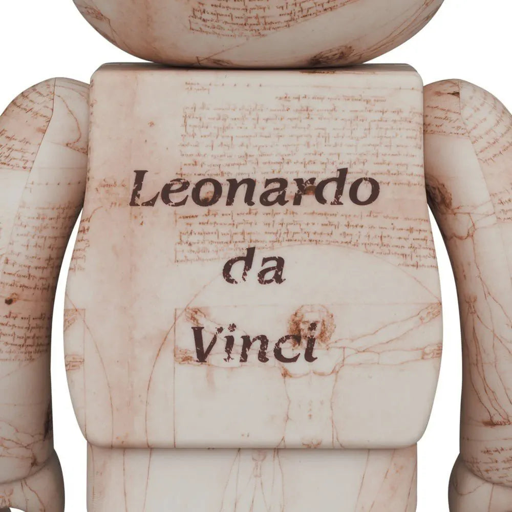 400% & 100% Bearbrick Set – Leonardo Da Vinci Vitruvian Man back view showing unique print placement of Renaissance sketches.