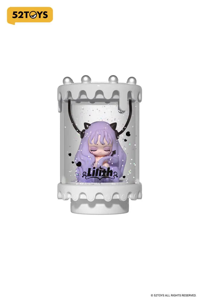 Lilith in clear glitter capsule with purple hair