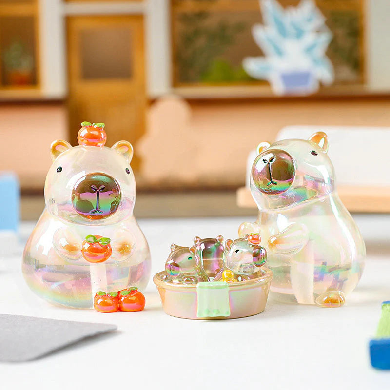 Special translucent rainbow versions of Little Bean Capybara figures with shiny finish.