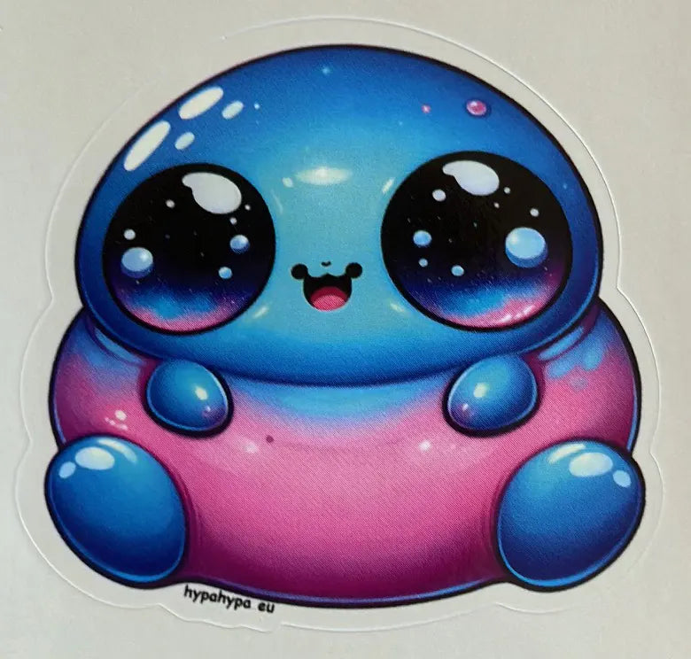 Close-up of HypaHypa Little Fat Alien sticker featuring a round, chubby blue and pink alien with big glossy eyes and a happy expression.