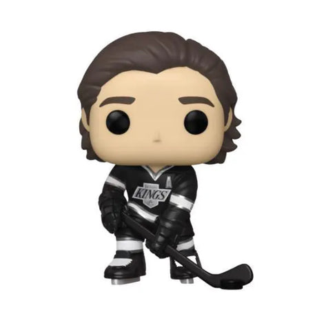 Close-up of Funko Pop! Luc Robitaille figure holding hockey stick in LA Kings gear.